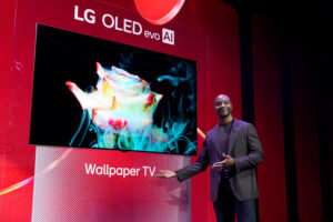 Aaron Westbrook, Senior Manager of Media Entertainment Solutions Marketing LG Electronics US, unveils LG OLED evo W6, the world’s thinnest, true wireless wallpaper TV during the CES 2026 news conference Monday, Jan. 5, 2026 in Las Vegas. (Jack Dempsey/AP Content Services for LG)